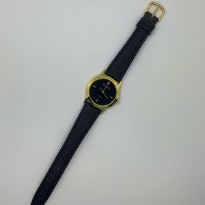 Black and gold watch